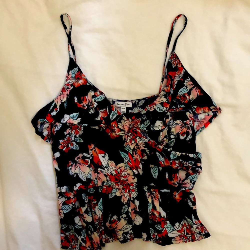 Spaghetti strap crossed ruffled top